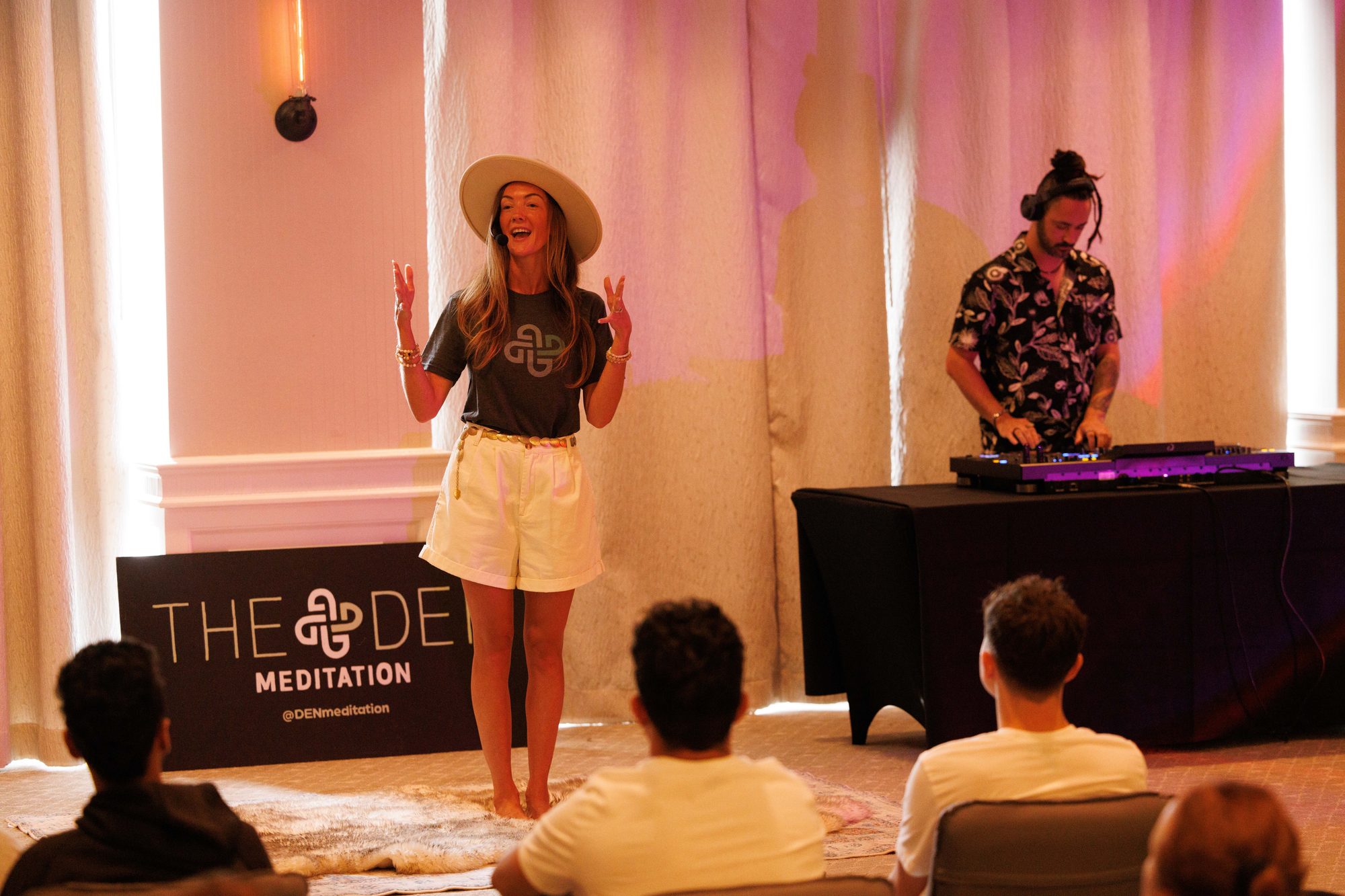 Christina Joy coaching a room, live